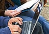 Uni Linz - arbeitende Hände mit Laptop